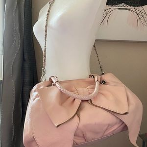 Ballet pink BeBe handbag.
